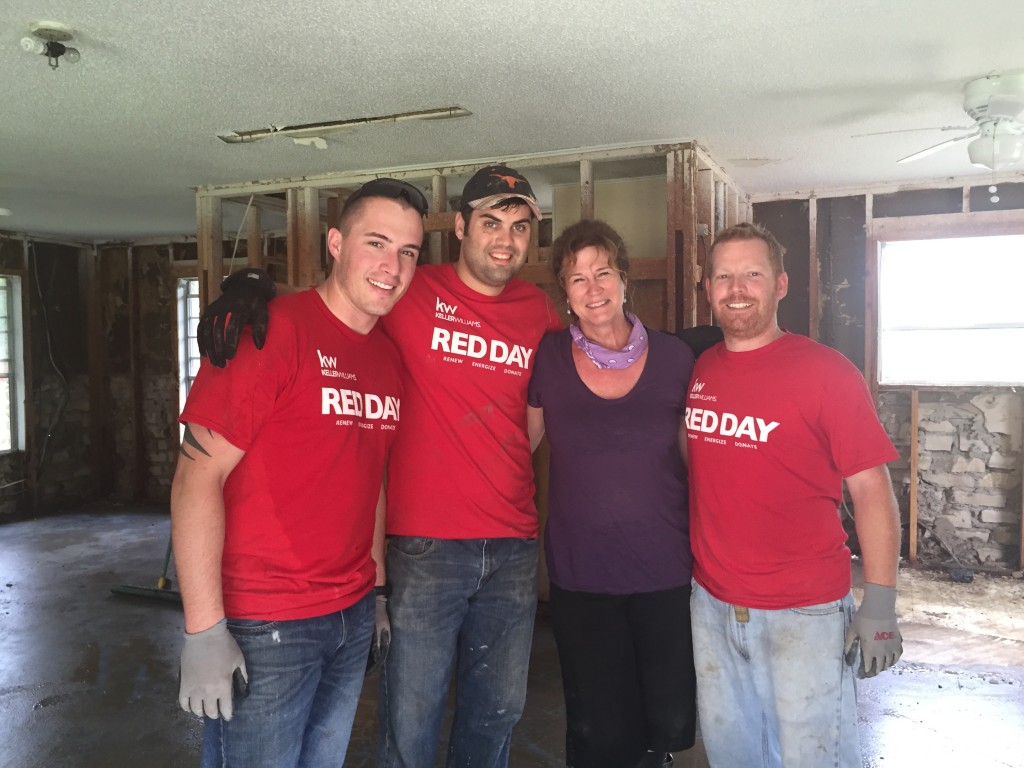 Keller Williams associates assist a homeowner in Wimberley, Tex. Keller Williams associates assist a homeowner in Wimberley, Tex.
